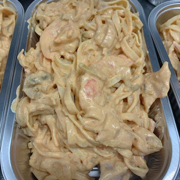 Verse tagliatelle, scampi van de chef **